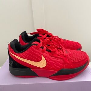 Nike Kids Red and Black Sneakers with Gold Swoosh
